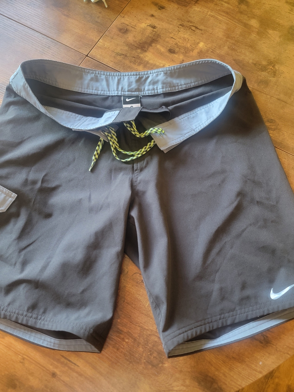 Nike Black Swim Shorts with Gray Waistband and Neon Green Drawcord